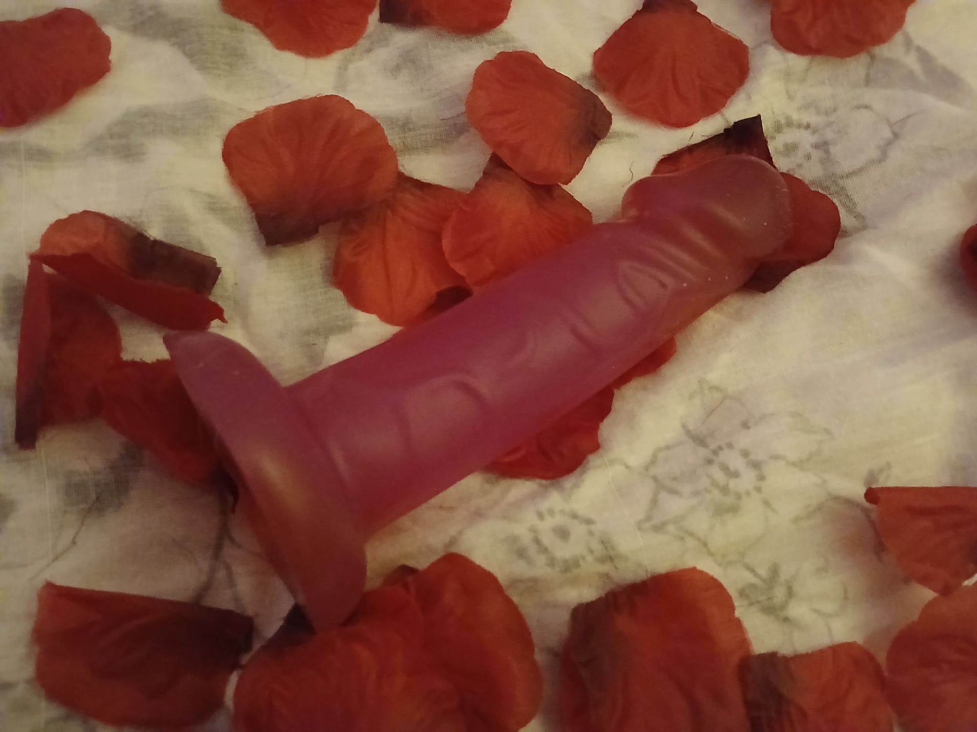 Lovehoney BASICS 6 inch suction cup dildo on a bed of roses